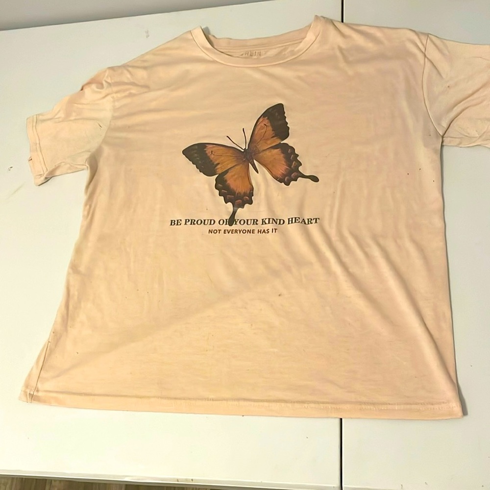 beige t-shirt. large. comfy and fitted.